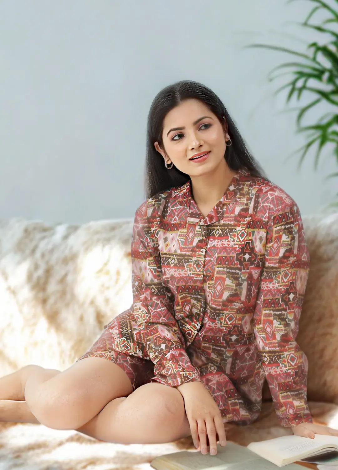 Babudu Model wearing -Rustic CHarm a soft 3-piece cotton Pyjama & loungewear set inspired by earthy tones and laid-back mornings. Perfect for relaxing weekends. Sleepwear- featuring a button-down top, pants, and shorts for a relaxed fit -there are plants on the sides banner